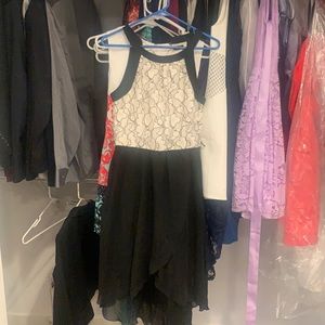 Cream and black formal dress.